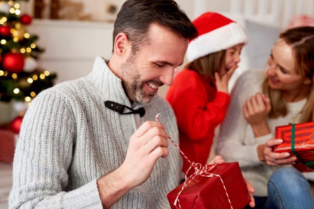 happy-man-opening-christmas-gift.jpg happy-man-opening-christmas-gift.jpg