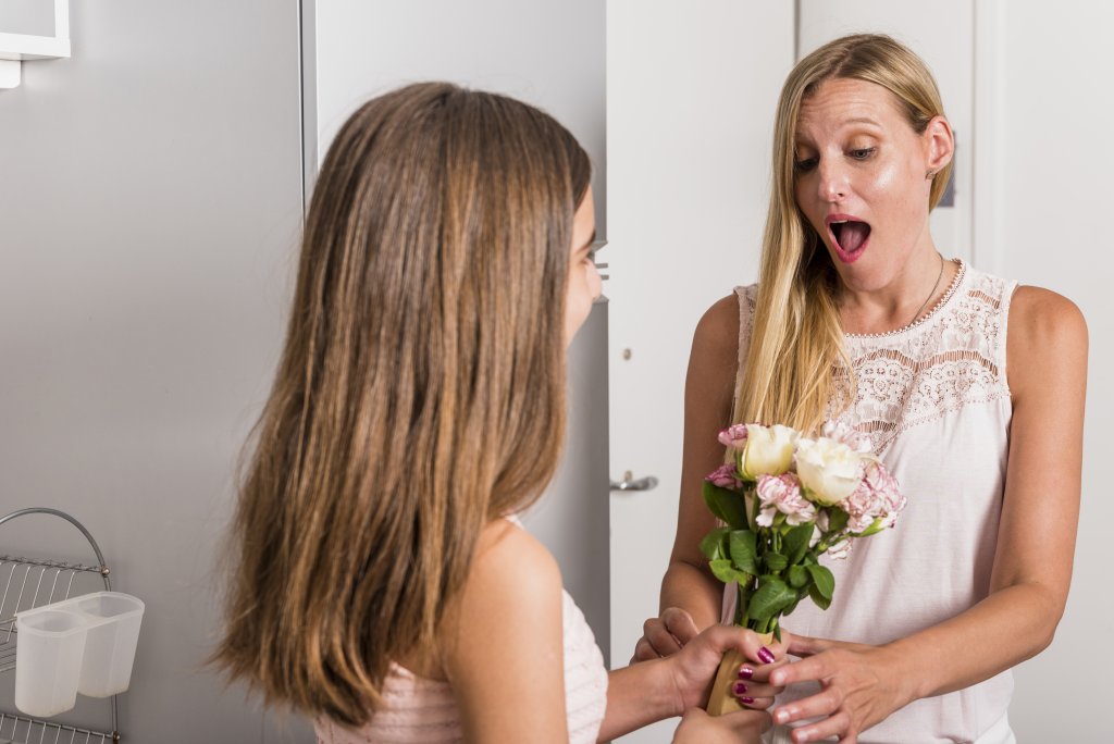 daughter-giving-flowers-to-amazed-mother.jpg daughter-giving-flowers-to-amazed-mother.jpg